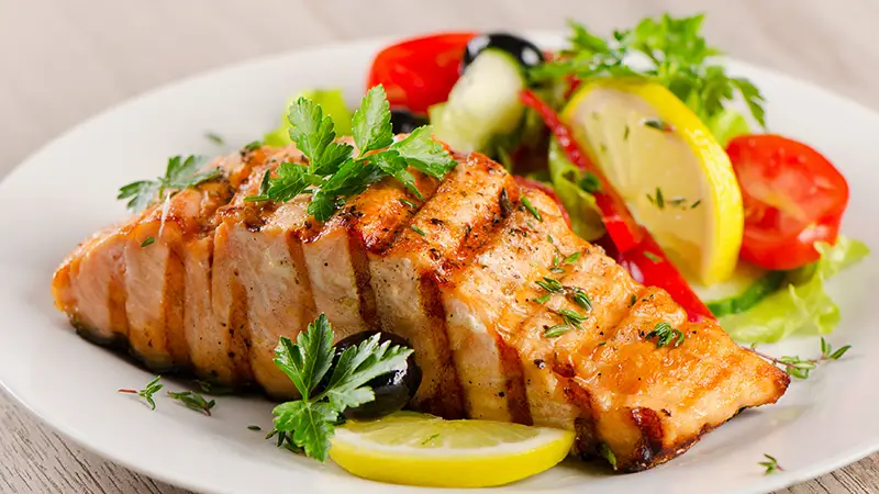 Salmon dish with salad at the Cala d'Or Playa Hotel restaurant